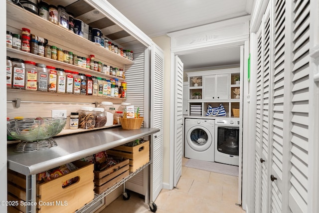 420 Tortoise View Cir, Satellite Beach, FL 32937 - washroom with washing machine and dryer and cabinet space