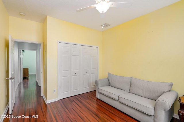 2871 Fontainebleau Ave SE, Palm Bay, FL 32909 - living area featuring wood finished floors, ceiling fan, and baseboards