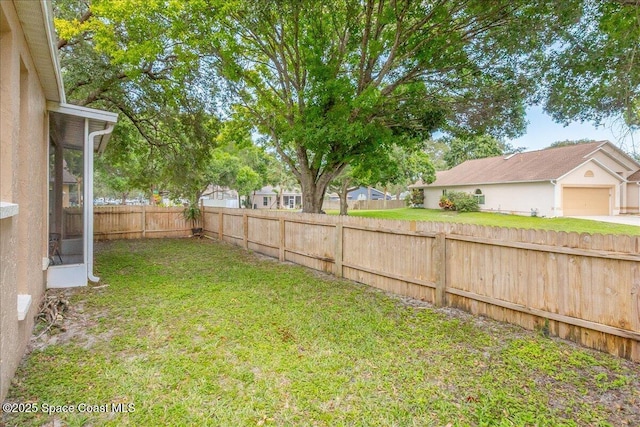 2508 Coral Ridge Cir, Melbourne, FL 32935 - view of yard featuring a garage
