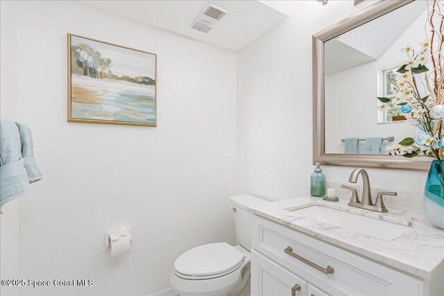 2508 Coral Ridge Cir, Melbourne, FL 32935 - half bathroom featuring vanity and toilet