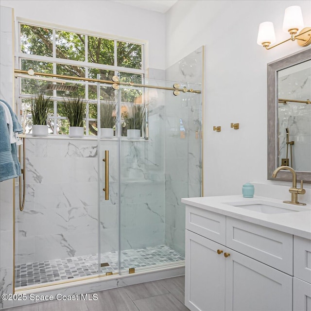 2508 Coral Ridge Cir, Melbourne, FL 32935 - full bathroom with vanity and a marble finish shower