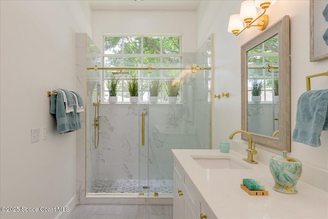2508 Coral Ridge Cir, Melbourne, FL 32935 - bathroom with a marble finish shower, vanity, and a chandelier