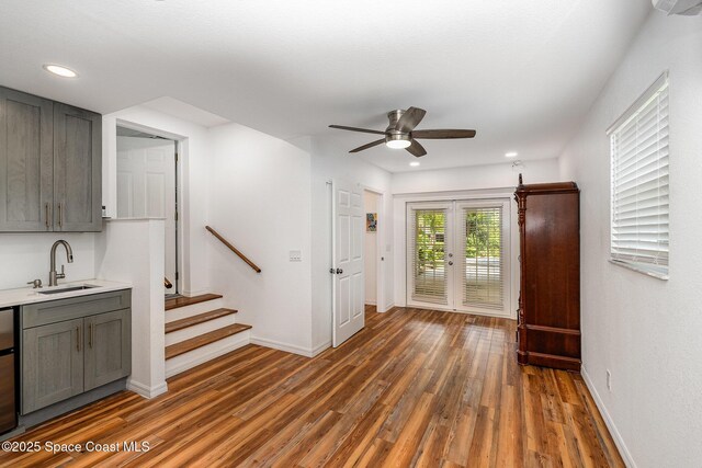118 S Indian Cir, Cocoa, FL 32922 - entrance foyer featuring wood finished floors, ceiling fan, baseboards, stairs, and recessed lighting