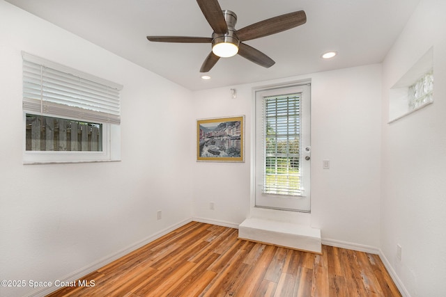 118 S Indian Cir, Cocoa, FL 32922 - unfurnished room featuring baseboards, light wood-type flooring, a ceiling fan, and recessed lighting
