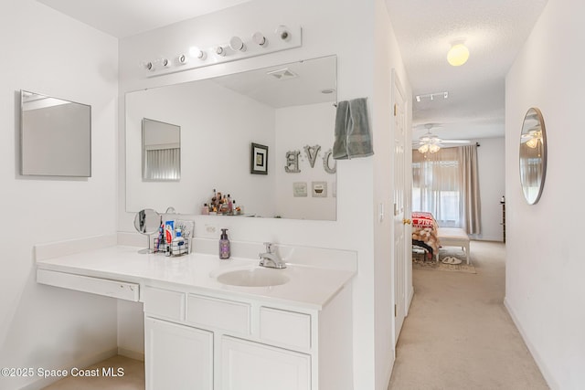 1889 Nanton St NW, Palm Bay, FL 32907 - bathroom with a ceiling fan, vanity, and baseboards