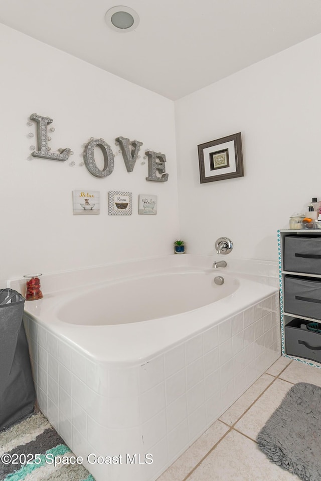 1889 Nanton St NW, Palm Bay, FL 32907 - bathroom featuring a bath and tile patterned floors