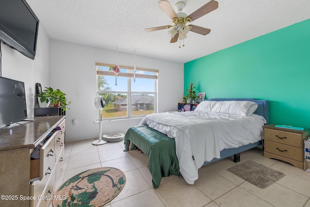 1889 Nanton St NW, Palm Bay, FL 32907 - bedroom with a textured ceiling, ceiling fan, and light tile patterned flooring