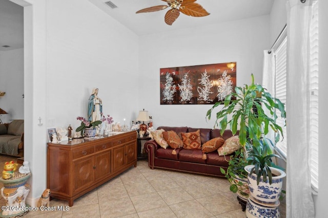 3385 Soft Breeze Cir, Melbourne, FL 32904 - living room featuring a ceiling fan and light tile patterned flooring