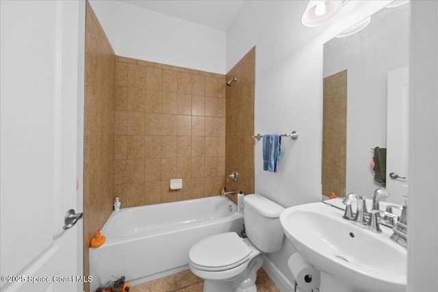 3385 Soft Breeze Cir, Melbourne, FL 32904 - full bathroom with toilet, a sink, washtub / shower combination, and tile patterned flooring
