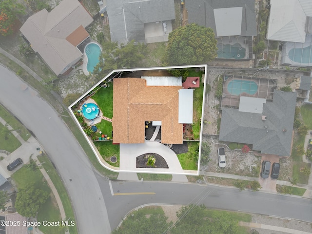 1475 Mars St, Merritt Island, FL 32953 - aerial view of residential area with a pool and property boundaries highlighted