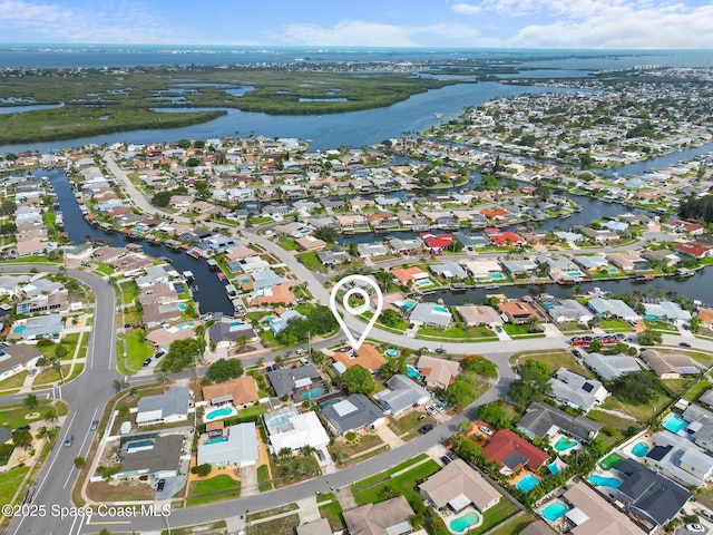 1475 Mars St, Merritt Island, FL 32953 - aerial view of property's location with a large body of water and nearby suburban area