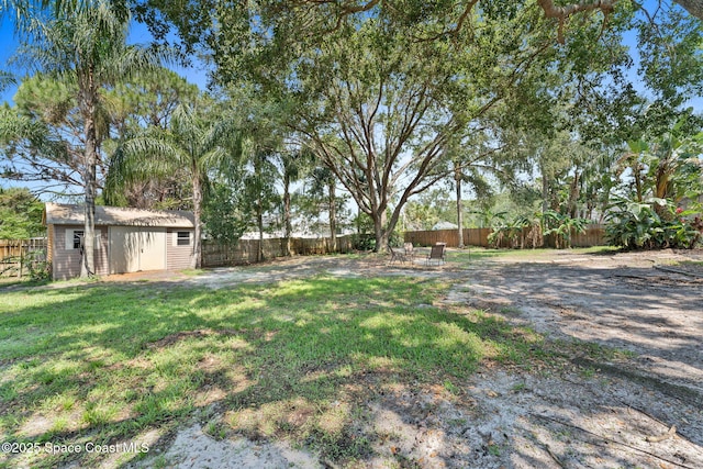 6858 Sweet Bay Ct, Cocoa, FL 32927 - view of yard with an outbuilding