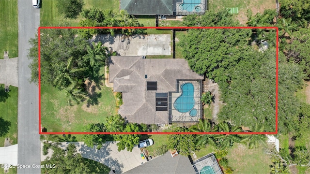 6858 Sweet Bay Ct, Cocoa, FL 32927 - aerial overview of property's location featuring a pool and property boundaries highlighted