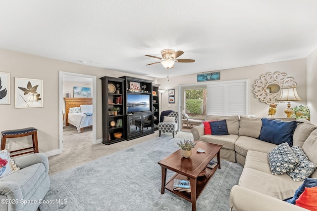 262 Prince William Ct, Satellite Beach, FL 32937 - living area with ceiling fan and carpet flooring