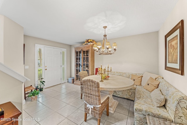 262 Prince William Ct, Satellite Beach, FL 32937 - dining room with a chandelier and light tile patterned flooring