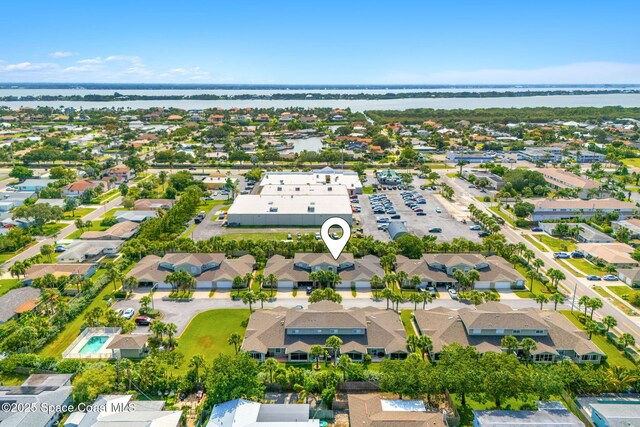 262 Prince William Ct, Satellite Beach, FL 32937 - aerial perspective of suburban area with a large body of water