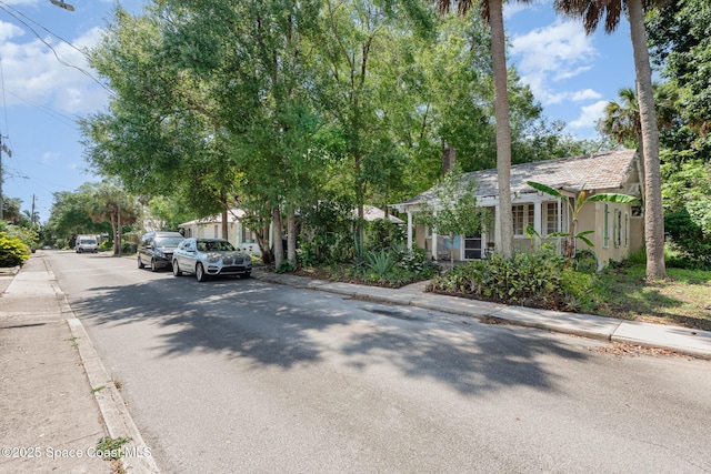 213 Sweet St, Rockledge, FL 32955 - view of asphalt road with sidewalks and curbs