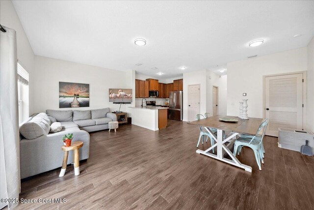 2500 Revolution St Unit 103, Melbourne, FL 32935 - living room with dark wood-style floors