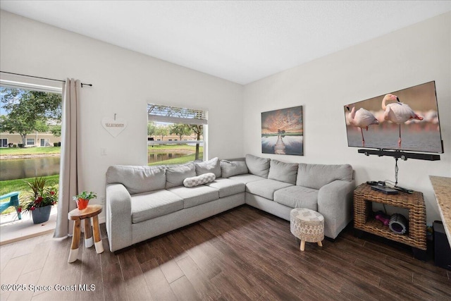 2500 Revolution St Unit 103, Melbourne, FL 32935 - living room with wood finished floors and vaulted ceiling