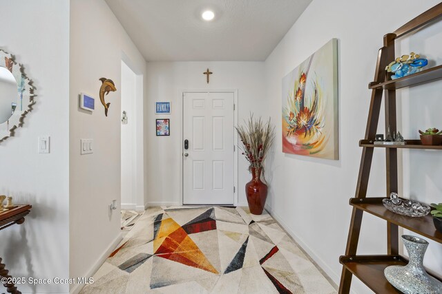 4554 Magenta Isles Dr, Melbourne, FL 32904 - foyer entrance with baseboards
