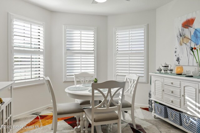 4554 Magenta Isles Dr, Melbourne, FL 32904 - dining area with plenty of natural light and baseboards