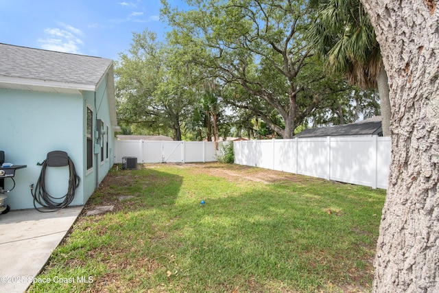 149 Kyle Ct NE, Palm Bay, FL 32907 - view of yard with central AC