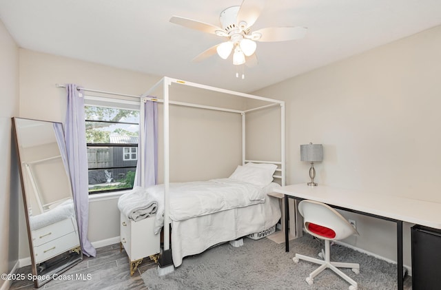 5145 Fay Blvd, Cocoa, FL 32927 - bedroom featuring a ceiling fan, wood finished floors, and baseboards