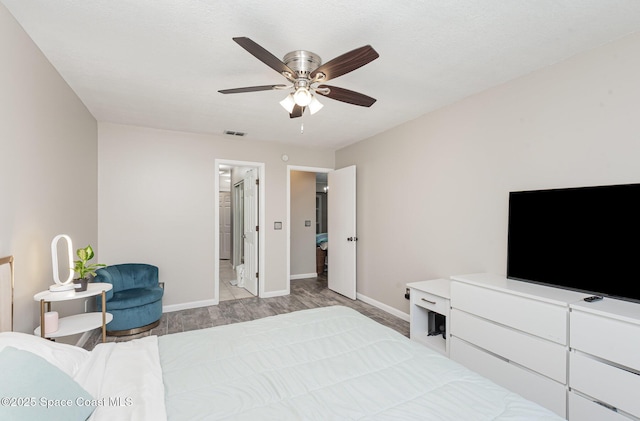 5145 Fay Blvd, Cocoa, FL 32927 - bedroom featuring baseboards, light wood finished floors, and a ceiling fan