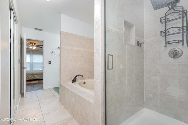 5145 Fay Blvd, Cocoa, FL 32927 - full bath featuring a shower stall, a bath, connected bathroom, tile patterned flooring, and ceiling fan