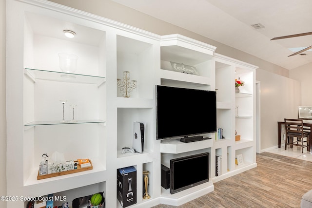 5145 Fay Blvd, Cocoa, FL 32927 - living room with wood finished floors and built in features