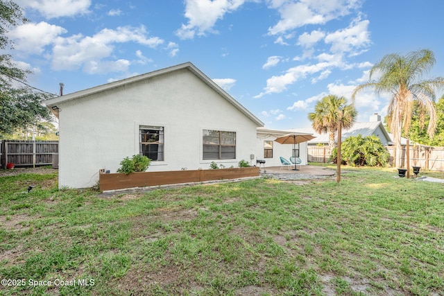 5145 Fay Blvd, Cocoa, FL 32927 - back of house with a patio and stucco siding