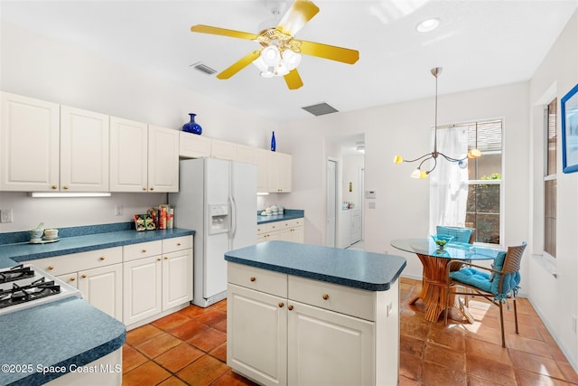 4341 Aberdeen Cir, Rockledge, FL 32955 - kitchen with white appliances, a ceiling fan, white cabinetry, decorative light fixtures, and recessed lighting
