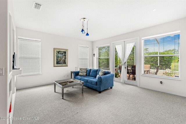4341 Aberdeen Cir, Rockledge, FL 32955 - living area with light colored carpet and baseboards