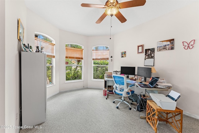 4341 Aberdeen Cir, Rockledge, FL 32955 - home office featuring carpet flooring, healthy amount of natural light, baseboards, and a ceiling fan