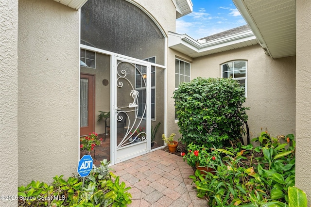 4341 Aberdeen Cir, Rockledge, FL 32955 - doorway to property featuring stucco siding