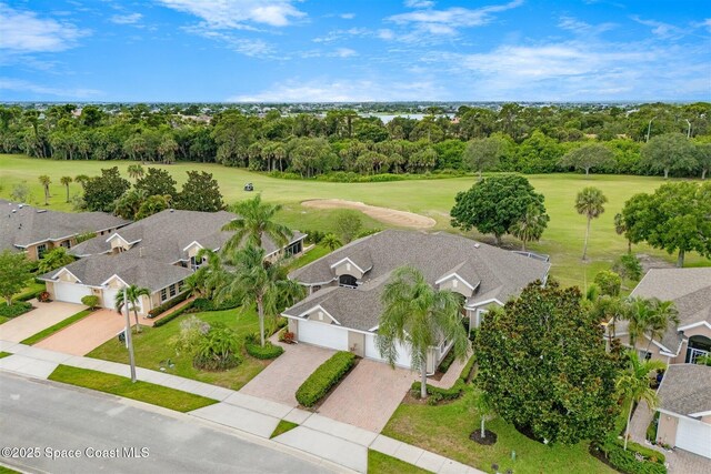 4341 Aberdeen Cir, Rockledge, FL 32955 - aerial view of residential area featuring a tree filled landscape and a golf course