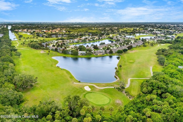 4341 Aberdeen Cir, Rockledge, FL 32955 - aerial perspective of suburban area with a large body of water, a golf club, and a tree filled landscape
