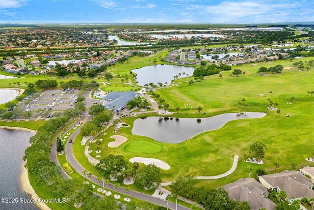 4341 Aberdeen Cir, Rockledge, FL 32955 - aerial view of property's location featuring nearby suburban area, a large body of water, and a golf course