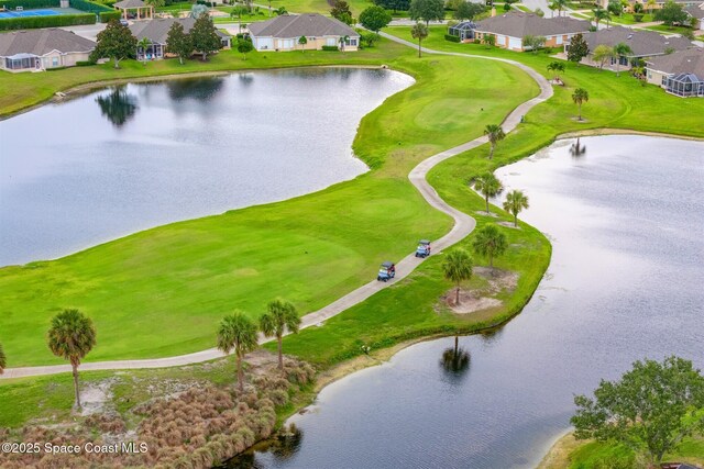 4341 Aberdeen Cir, Rockledge, FL 32955 - aerial perspective of suburban area featuring a nearby body of water and a golf club