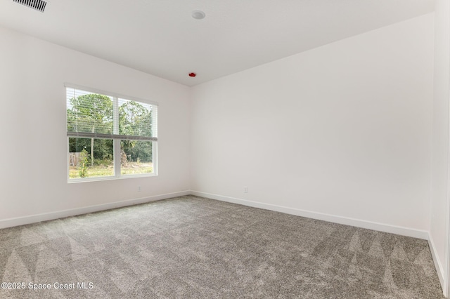 1795 Fallon Blvd NE Unit 06, Palm Bay, FL 32907 - unfurnished room featuring carpet and baseboards