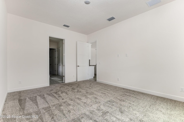 1795 Fallon Blvd NE Unit 06, Palm Bay, FL 32907 - carpeted empty room featuring baseboards
