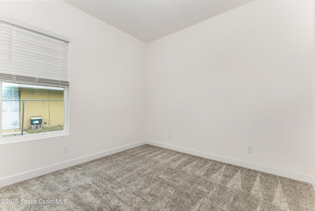 1795 Fallon Blvd NE Unit 06, Palm Bay, FL 32907 - unfurnished room with carpet floors and baseboards