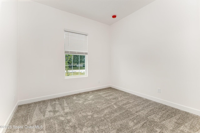 1795 Fallon Blvd NE Unit 06, Palm Bay, FL 32907 - unfurnished room featuring carpet and baseboards