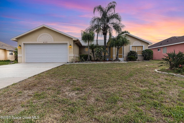 409 Americana Blvd NE, Palm Bay, FL 32907 - ranch-style house with stucco siding, concrete driveway, a yard, and a garage