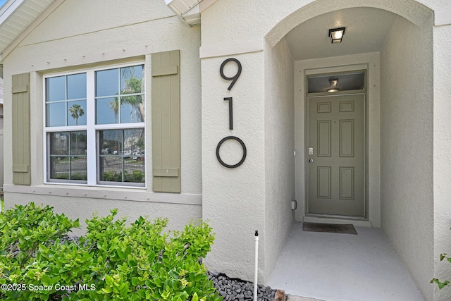 910 Swiss Pointe Ln, Rockledge, FL 32955 - view of exterior entry with stucco siding