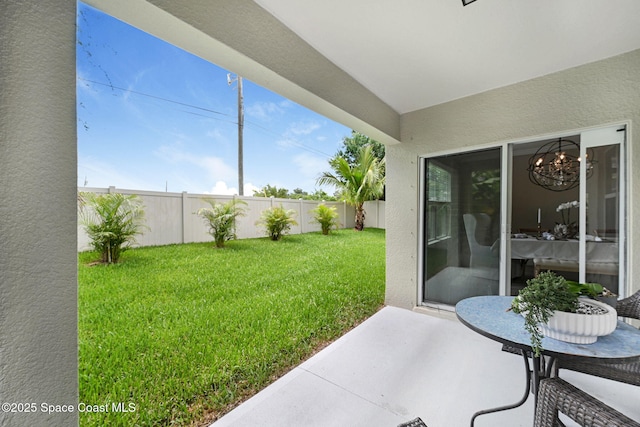 910 Swiss Pointe Ln, Rockledge, FL 32955 - fenced backyard featuring a patio area