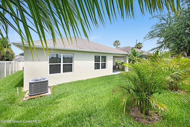 910 Swiss Pointe Ln, Rockledge, FL 32955 - back of property with stucco siding