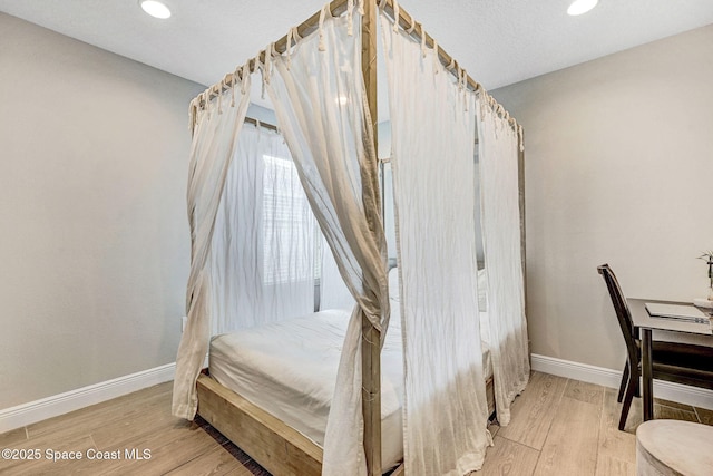 910 Swiss Pointe Ln, Rockledge, FL 32955 - bedroom featuring light wood-type flooring and recessed lighting
