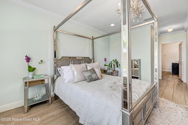 910 Swiss Pointe Ln, Rockledge, FL 32955 - bedroom with crown molding and wood finished floors