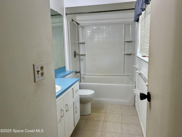 1899 Barker St NE, Palm Bay, FL 32907 - full bathroom featuring vanity, toilet, tile patterned floors, and bathtub / shower combination